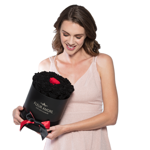 Black & One Red Preserved Roses | Small Round Black Huggy Rose Box